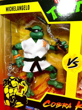 Load image into Gallery viewer, 2021 Playmates - TMNT vs. Cobra Kai 2-Pack: MICHELANGELO vs DANIEL LARUSSO